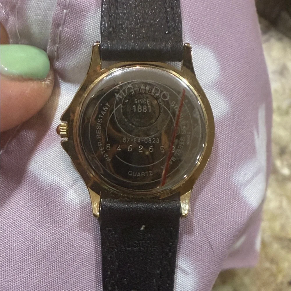 Authentic Women’s Vintage Movado Museum watch Gold face quartz crystal movement